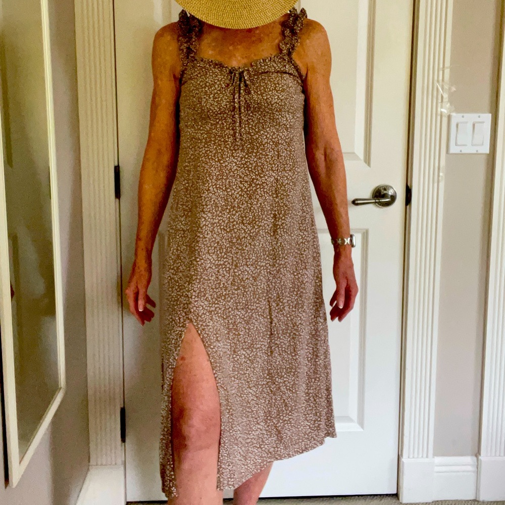 Summertime dress form fitting top looks great with a tan!